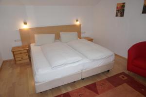 Postel nebo postele na pokoji v ubytování Haus Christine