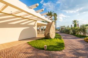 A garden outside Hotel Club Saraceno - Bovis Hotels