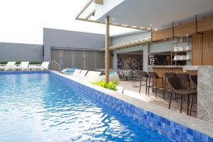 an image of a swimming pool in a house at Bayfront Hotel Cebu Capitol Site in Cebu City