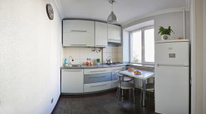 Η κουζίνα ή μικρή κουζίνα στο Babylon Apartments On Chornovola