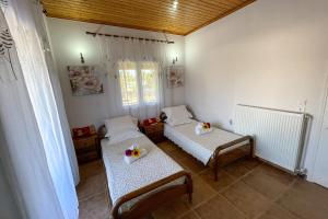 Posteľ alebo postele v izbe v ubytovaní Villa Vicky Corfu