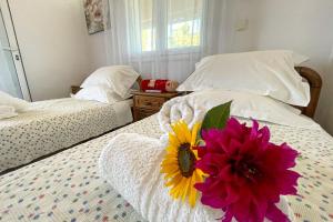 Posteľ alebo postele v izbe v ubytovaní Villa Vicky Corfu
