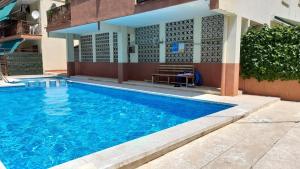 Πισίνα στο ή κοντά στο Apartamento con piscina y bonita terraza