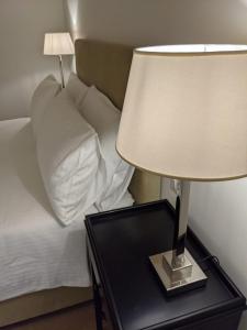 A bed or beds in a room at Magnifica Vittorio Veneto