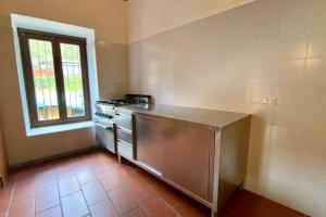 Kuchyň nebo kuchyňský kout v ubytování L'Oasi nel Borgo