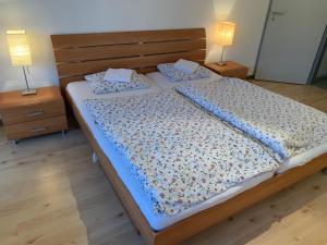 Posteľ alebo postele v izbe v ubytovaní Apartmány Čertovka