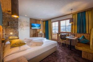 Posteľ alebo postele v izbe v ubytovaní Liebes Caroline 4-Sterne-Hotel