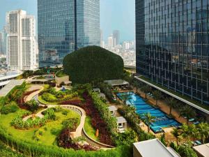 a cityscape of a city with tall buildings at Raffles Jakarta in Jakarta