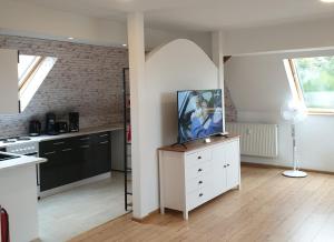 Kuchyň nebo kuchyňský kout v ubytování Vogelnest Riesa