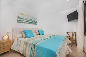 Ein Bett oder Betten in einem Zimmer der Unterkunft Cana Ferrera
