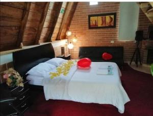 Postel nebo postele na pokoji v ubytování ASGARD Spa