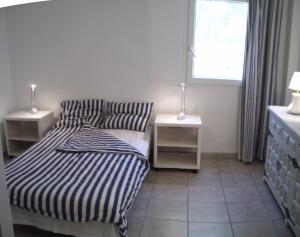 Ένα ή περισσότερα κρεβάτια σε δωμάτιο στο Villa-Tauro Leyh