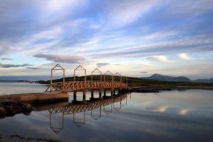 a wooden bridge over a body of water at Mulranny Park Hotel in Mulranny