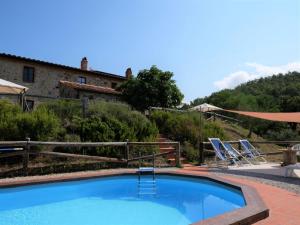 The swimming pool at or close to Apartment Pian dei Carpini - Janis by Interhome