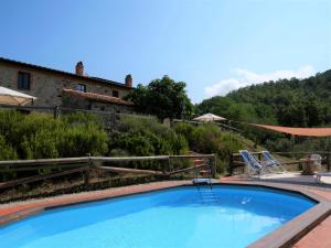The swimming pool at or close to Apartment Pian dei Carpini - Janis by Interhome