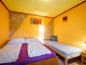 Posteľ alebo postele v izbe v ubytovaní Holiday Home Christoph by Interhome