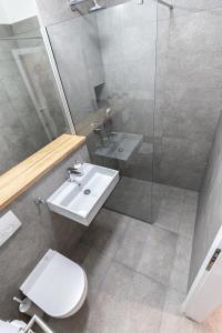 Koupelna v ubytování Apartmani Bilonic Rogoznica