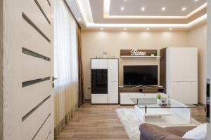 Televízia a/alebo spoločenská miestnosť v ubytovaní BpR Pure Nature Designer Suite