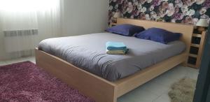 A bed or beds in a room at Au fil de la Loire
