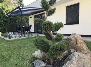 Vonkajšia záhrada v ubytovaní HausLipno Bungalov na Lipně