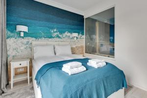 Posteľ alebo postele v izbe v ubytovaní GRANO APARTMENTS Gdańsk Old Town SPA & Wellness - GRANO APARTMENTS Gdańsk Residence SPA & Wellness