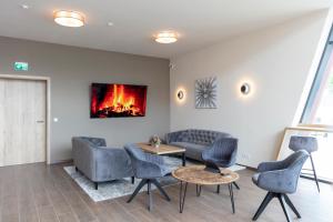 Posezení v ubytování Dominik Hotel & Eventsaal