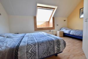 מיטה או מיטות בחדר ב-Resort De Vlasschure