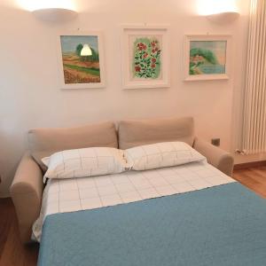Кровать или кровати в номере Giardino delle rose