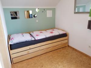 En eller flere senge i et værelse på Ferienwohnung Robl