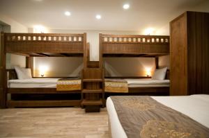 Postel nebo postele na pokoji v ubytování Ferman Konak Hotel-Special Category