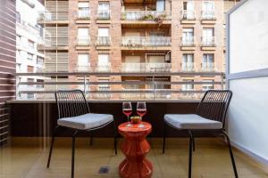 Balkon lub taras w obiekcie New Amara Suite Friends & Families Parking