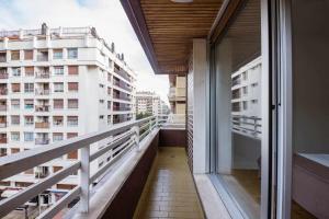 Balkon lub taras w obiekcie New Amara Suite Friends & Families Parking