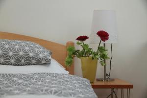 Posteľ alebo postele v izbe v ubytovaní Villa Schnuck - das rote Ferienhaus