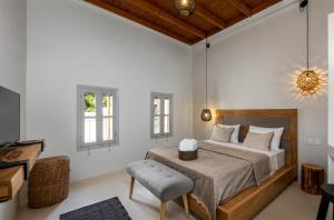 Postel nebo postele na pokoji v ubytování Voyaz Boutique Apartments & Suites -Old Town