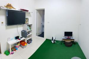 TV/trung tâm giải trí tại Living House