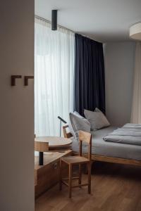 A bed or beds in a room at Haus am Turm