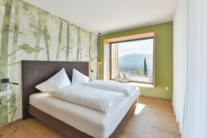 Säng eller sängar i ett rum på Villa Montis