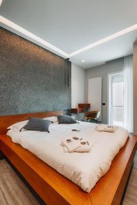 Postel nebo postele na pokoji v ubytování Sama Apartments Sorrento