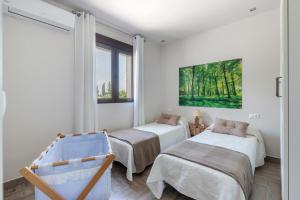 Postel nebo postele na pokoji v ubytování VILLA FINA (piscina/wifi/barbacoa/parking) + 37 fotografií