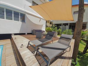 Mynd úr myndasafni af Kozycoco - Suite Coco - votre séjour tropical au calme í Cluny