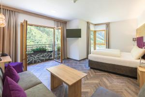 Łóżko lub łóżka w pokoju w obiekcie Hotel Gundolf