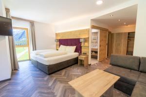 Łóżko lub łóżka w pokoju w obiekcie Hotel Gundolf