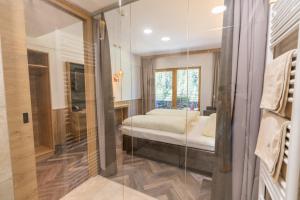 Łóżko lub łóżka w pokoju w obiekcie Hotel Gundolf
