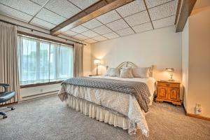 Un dormitorio con una cama y una ventana grande en Gorgeous Bremen Home with Lake Access and Yard!, en Bremen