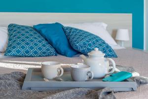 A bed or beds in a room at Villa Candelara
