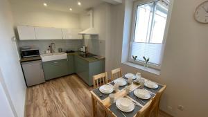 Kuchyňa alebo kuchynka v ubytovaní Apartament Niebieski