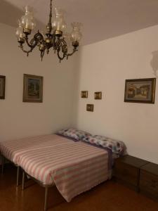Postel nebo postele na pokoji v ubytování U'Giruni