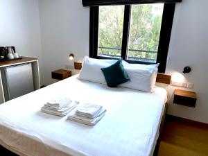 Ένα ή περισσότερα κρεβάτια σε δωμάτιο στο Urban Habitat Executive Suites