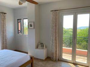 Postel nebo postele na pokoji v ubytování 350m Above Sea + 20 fotografií