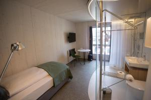 Ein Bett oder Betten in einem Zimmer der Unterkunft Gasthaus zum Trauben